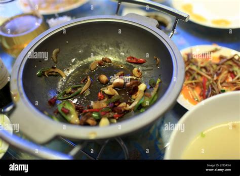 Leftovers of frog legs in a chinese restaurant Stock Photo - Alamy