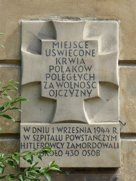 A Tchorek plaque on Długa Street Warsaw uprising Plaque Commemoration