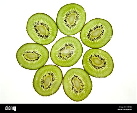 Sliced Kiwifruit Isolated On White Studio Shot Stock Photo Alamy