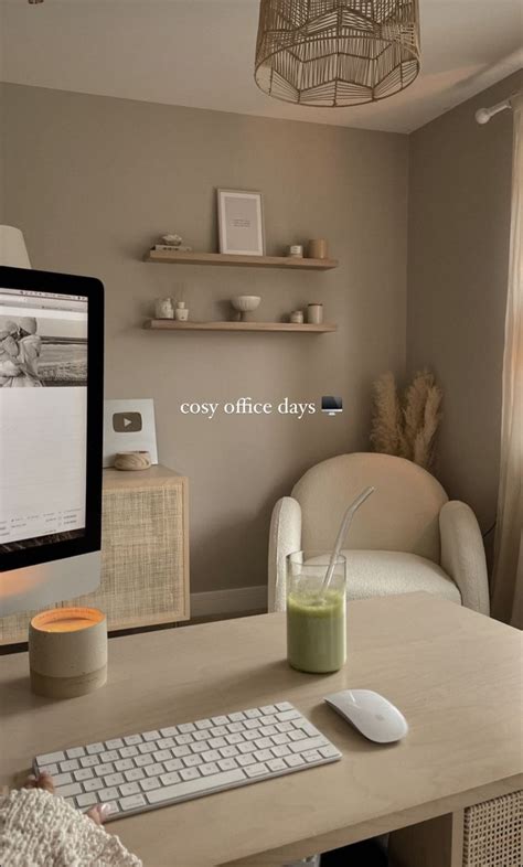 A Computer Monitor Sitting On Top Of A Wooden Desk