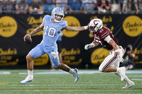 Unc Football Smothers South Carolina In Season Opening Victory