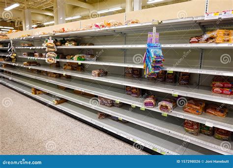 Empty Grocery Store Shelves of Bread before a Hurricane or Snow Storm ...