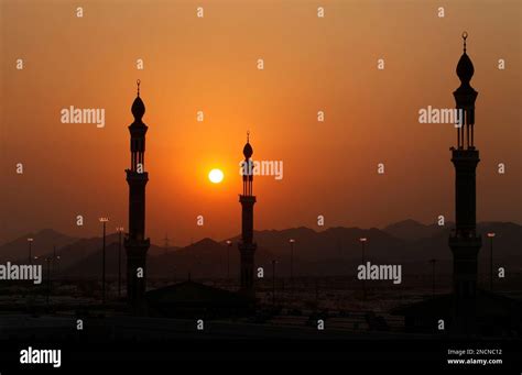 The Minarets Of Namira Mosque Are Seen During Prayers At Sunset In