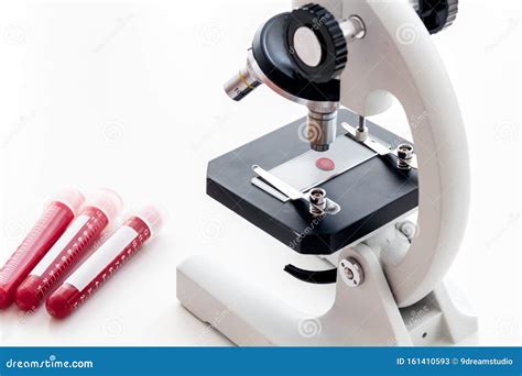 Blood Testing Samples Viewing Under Microscope On White Background Top