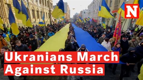 Watch Thousands Of Ukrainian Residents March Against Russia As Tension