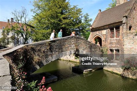 A Small Amount Of Tourists Visits The Medieval City Of Bruges On May