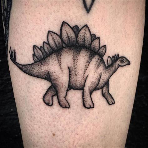 Blackwork Stegosaurus Tattoo On The Calf