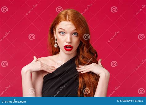 Gorgeous Shocked Glamorous Pin Up Model Posing In Pink Polka Dot Lingerie Stock Photo