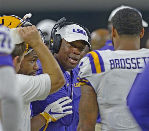 Pay bumps, contract changes for two LSU football coaches passed by ...