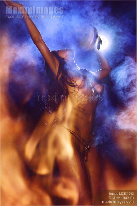 Photo Of Nude Aboriginal Tribal Woman Purification Ritual With A Shamanic Drum Dancing At Night