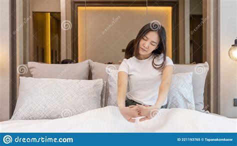 Stretch Oneself Beautiful Asian Woman Waking Up In The Morning In Her