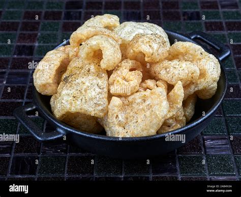 Pork Rinds Also Known As Chicharron Or Chicharrons Deep Fried Pork