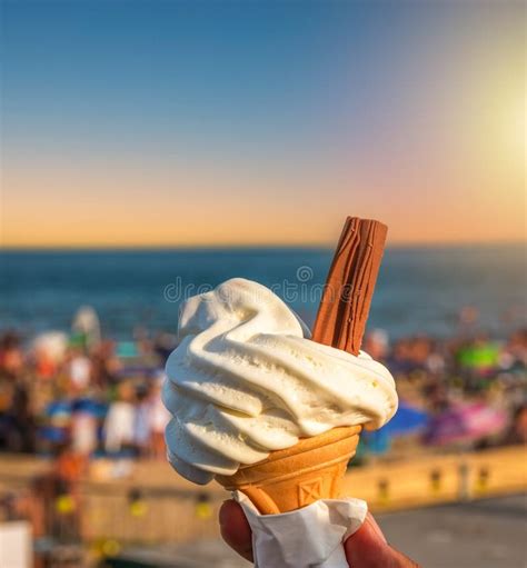 Ice Cream Cone Held Up To The Hot Summer Sky Stock Photo Image Of Colorful England