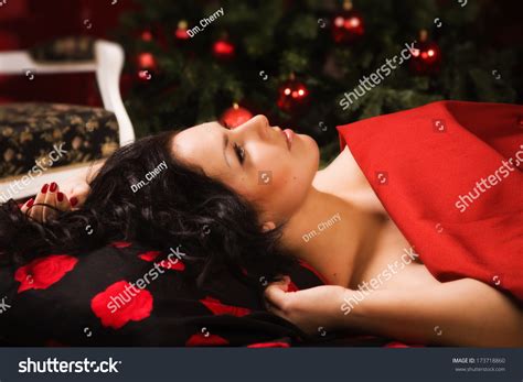 Sexy Brunette Lying On The Bed With A Red Linens Stock Photo 173718860 Shutterstock