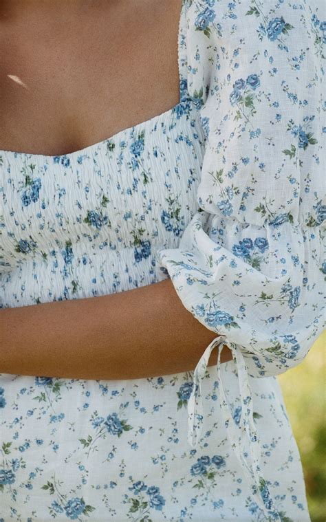 faithfull  brand marita floral print linen midi dress faithfull