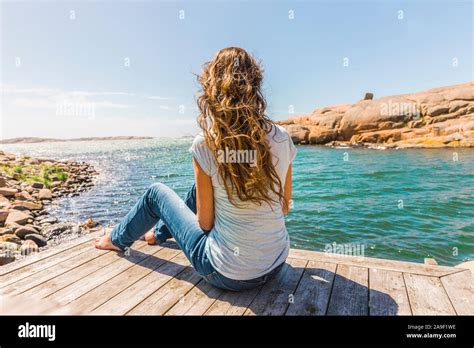 Woman jetty blue tshirt hi-res stock photography and images - Alamy