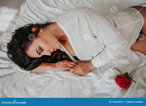 Girl In Lingerie Lying On A Bed With A Rose Stock Image Image Of Glamour Flowers 166324411