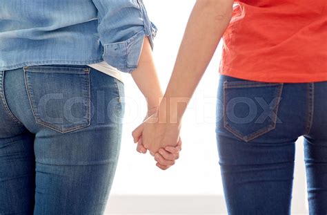 Close Up Of Lesbian Couple Holding Hands Stock Image Colourbox