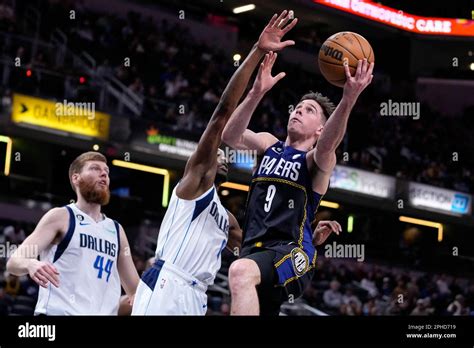 Indiana Pacers Guard T J Mcconnell 9 Shoots Over Dallas Mavericks