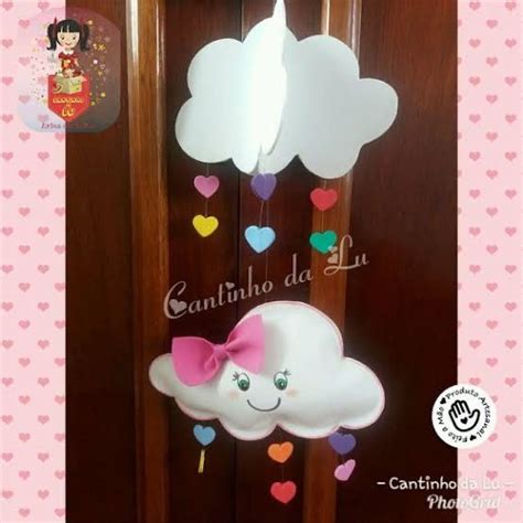 The Door Is Decorated With Hearts And Clouds