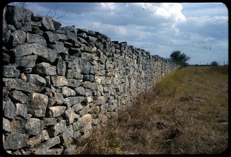 [Rock Wall Receding into Background] - The Portal to Texas History