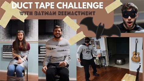 HUSBAND TAPES WIFE TO CHAIR COUPLES DUCT TAPE CHALLENGE BATMAN