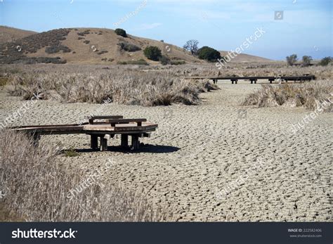 Drought Conditions In California, Dried Up Lake Bed With Pier Jetty Out ...