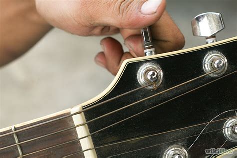 Cara Mengganti Senar Gitar Akustik Ukm Band