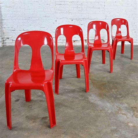 Modern To Post Modern Henry Massonnet Red Plastic Stacking Chairs Set