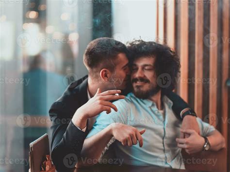 Portrait Of Multiethnic Diverse Gay LGBT Romantic Male Couple Embracing And Showing Their Love