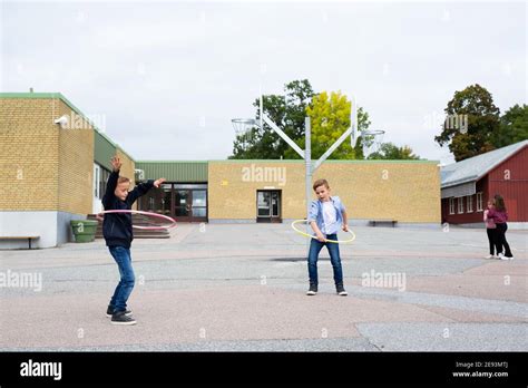 Children playing on school yard Stock Photo - Alamy