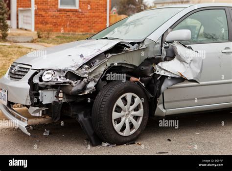 Car with front end accident damage - USA Stock Photo - Alamy