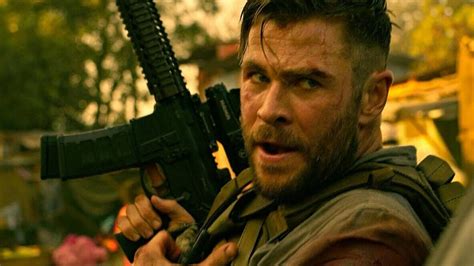 See Chris Hemsworth In A Fiery Fight Scene For Extraction Giant