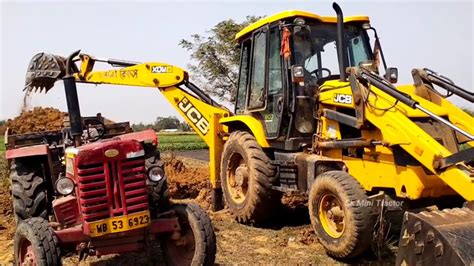 New Jcb 3dx Backhoe Loader Machine Loading Mud In Two Mahindra 475 Di