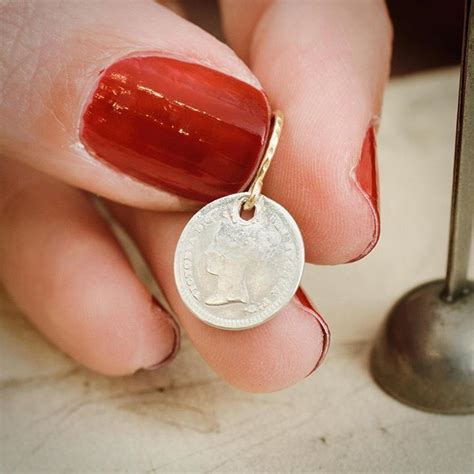 A Pair Of One Penny Maundy Coins Dated To 1860 And 1862 Which As They Came To Us Holed We Have