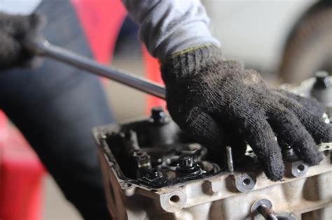 Premium Photo The Mechanic Is Checking The Engine