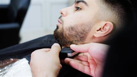 The Process Of Haircuts In A Barbershop Barber Carefully Trims The