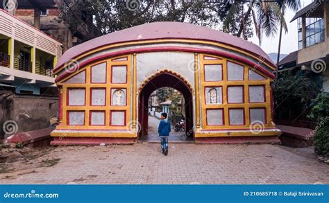 A Colorful Arched Gateway In The Traditional Assamese Style