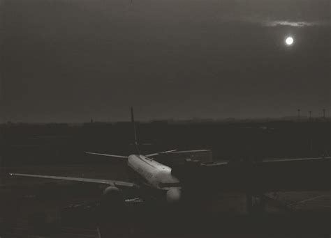 Premium Photo | Airplane on runway at night