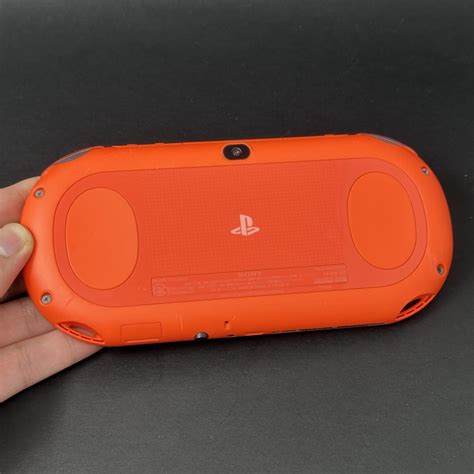PS Vita Slim (128GB) – 580 Games | Neon Orange – Samtendo