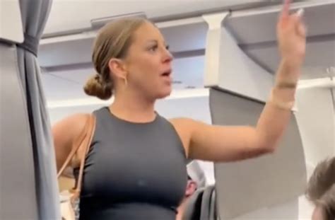 Woman Has Meltdown On Plane Video Claims Person Is Not Real