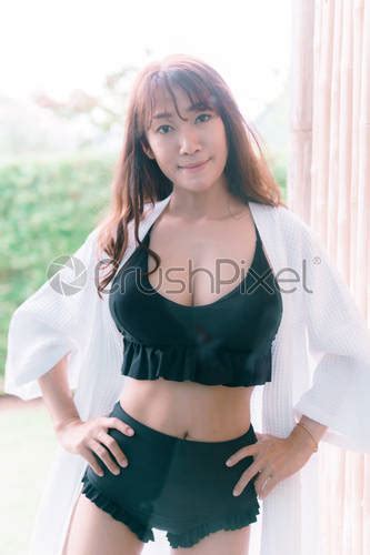 Asian Woman In A Sexy Black Bikini In A Hotel Stock Photo Crushpixel
