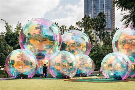 Playful Installation Of Giant Bubbles Takes Over Public Spaces