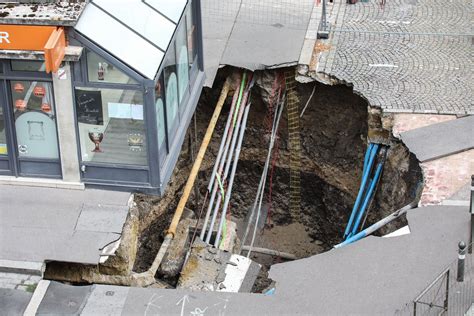 Huge Sinkhole Swallows Car In The Middle Of The Night Newsweek