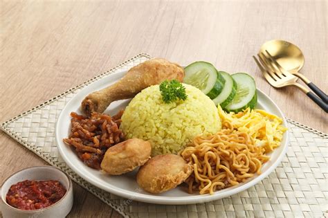 Premium Photo Nasi Kuning Indonesian Traditional Food Made From Rice Cooked With Turmeric