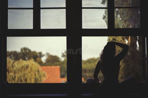 Beautiful Naked Female Sitting On A Window At Sunset Stock Photo Image Of Sitting Warm