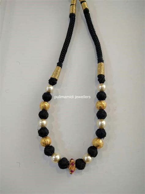 Pin By Navya Ayyanagari On Beads Jewellery Black Beaded Jewelry Gold