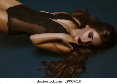 Sexy Beautiful Brunette Woman Lying On Stock Photo Shutterstock