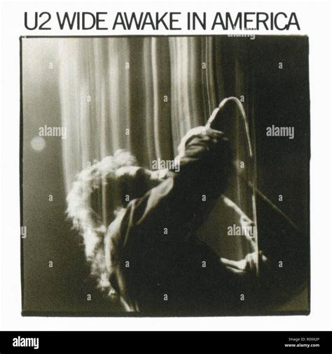 U2 WIDE AWAKE IN AMERICA - Vintage cover album Stock Photo - Alamy