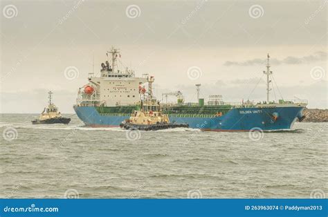 Golden Unity Cargo Ship Entering The Port Of Newcastle Editorial Stock